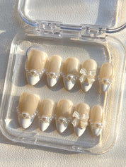 Elegant Pearl Bow Nails