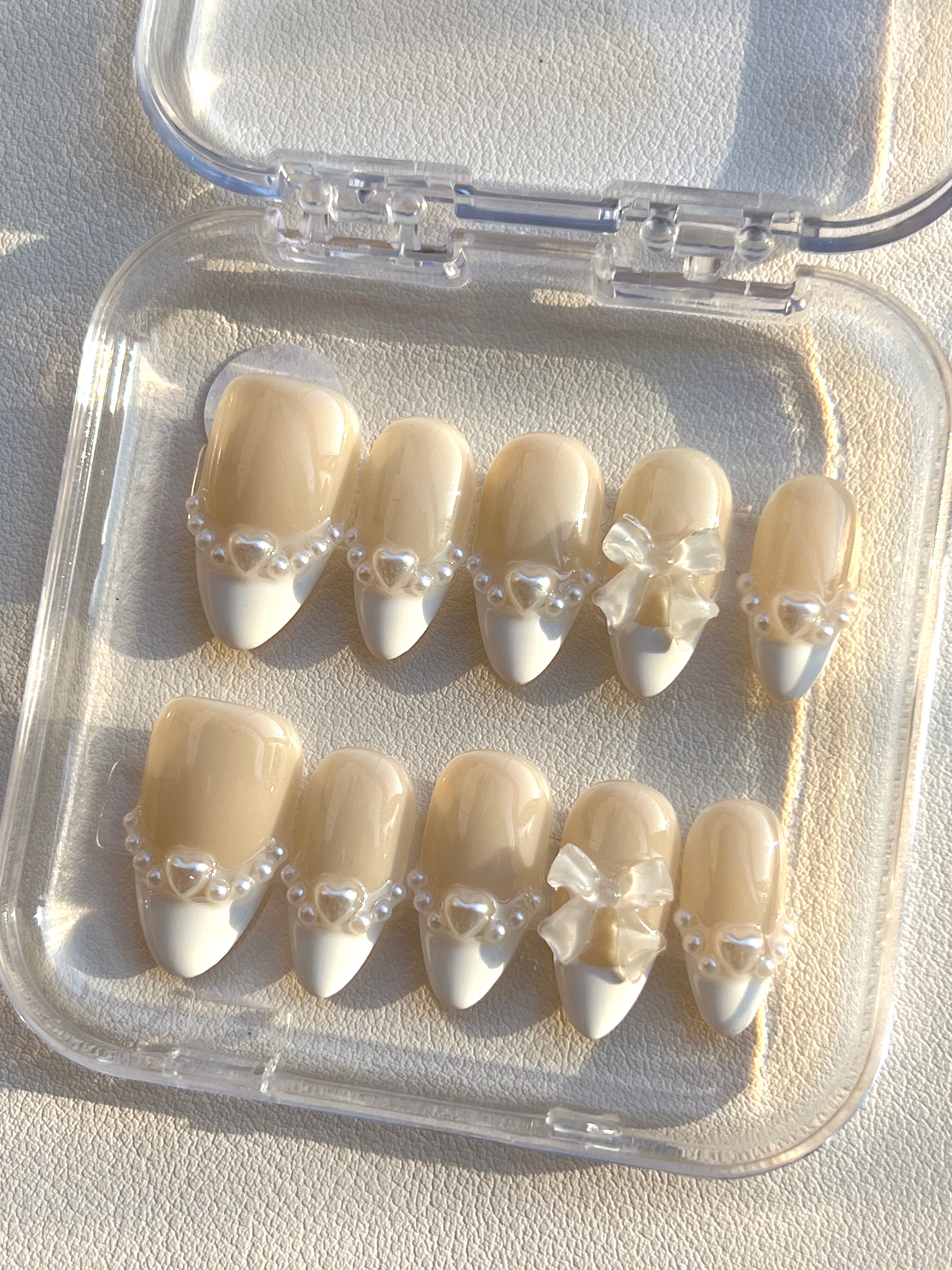 Elegant Pearl Bow Nails