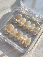 Elegant Pearl Bow Nails