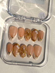 Gilded Pearl Elegance Nails