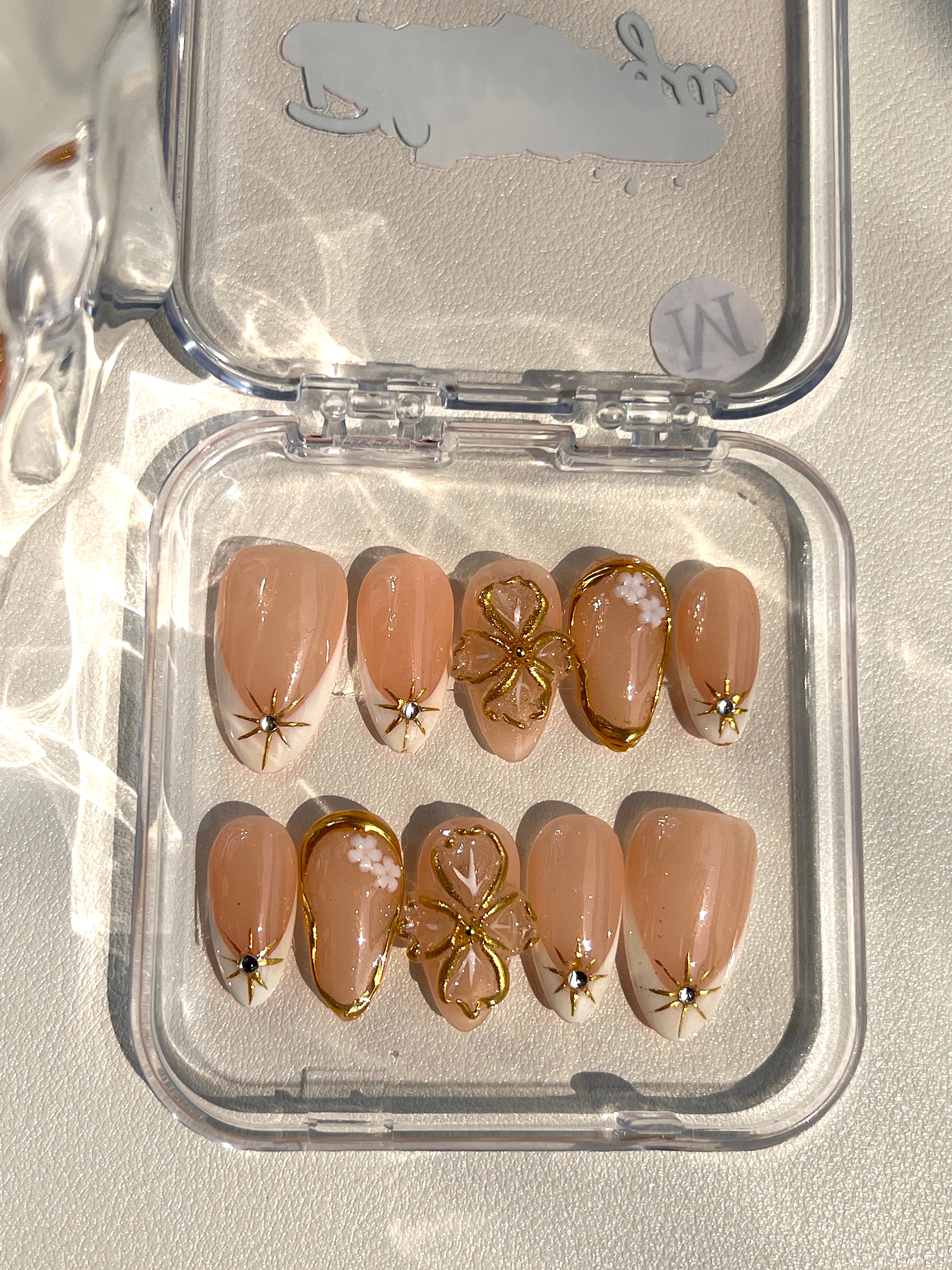 Gilded Pearl Elegance Nails