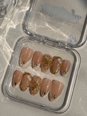 Gilded Pearl Elegance Nails